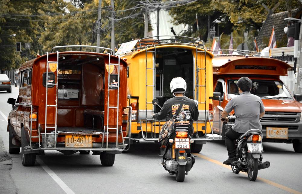 Thailand-Traffic - Tuk Tuk and Motocycles